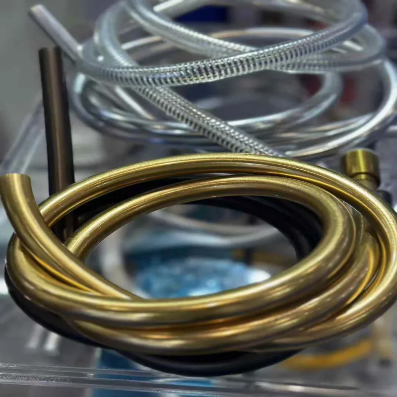 An array of PVC reinforced hoses, from industrial braided hoses to colorful consumer shower hoses